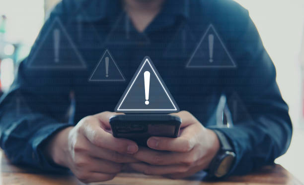 istock Emergency warning alert alarm on Smartphone, Data network protection, Virus alarm. 1846502827