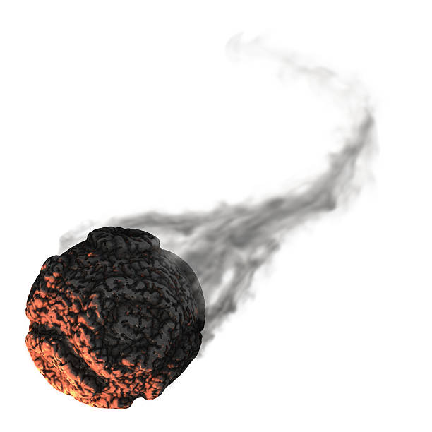 Image of a spherical meteor isolated on a white background Glowing hot meteor with smoke trail isolated on white.   meteor crater photos stock pictures, royalty-free photos & images