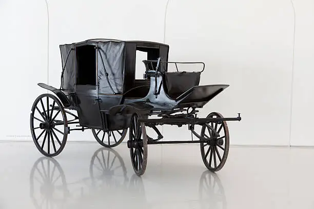Antique carriage on a white background