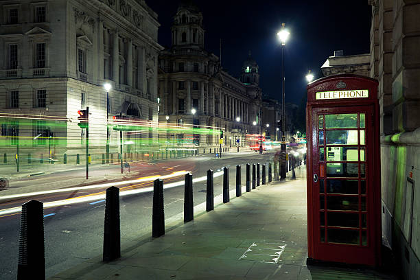 istock London Red Phone Booth at Night and Traffic 184651414