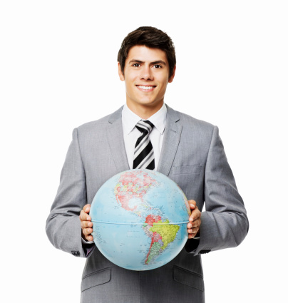 Young businessman stands with a globe of the Earth in his hands. Square shot. Isolated on white.