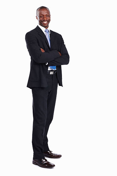 African American executive smiling Full length of confident African American business man smiling on white background business suit stock pictures, royalty-free photos & images