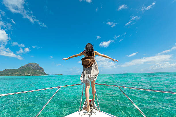 istock Woman standing on edge of ship wanting to fly 184652043