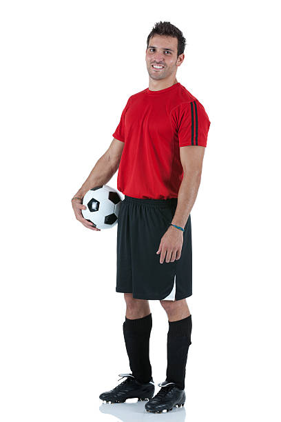 porträt-spieler hält einen fußball - soccer player soccer men smiling stock-fotos und bilder