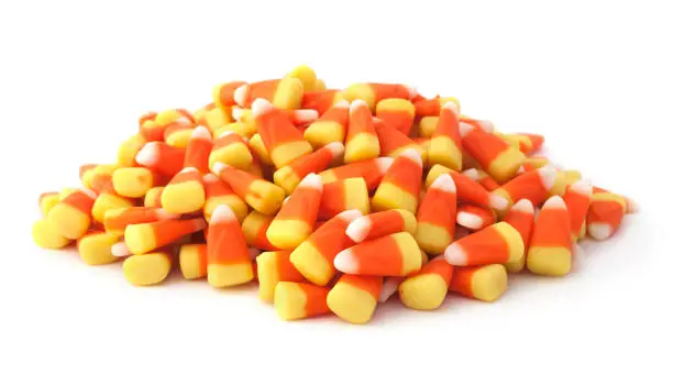 Isolated halloween candy corns on a white background.Please see some similar pictures: