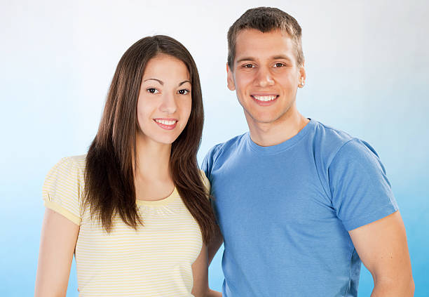 istock Smiling teenage couple. 184654077