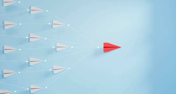 istock Leadership concept, red leader plane leading white plane, on blue background. 1846543204