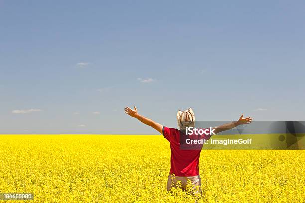 Happy Caucasian Male On The Prairie In Canola Field Stock Photo - Download Image Now