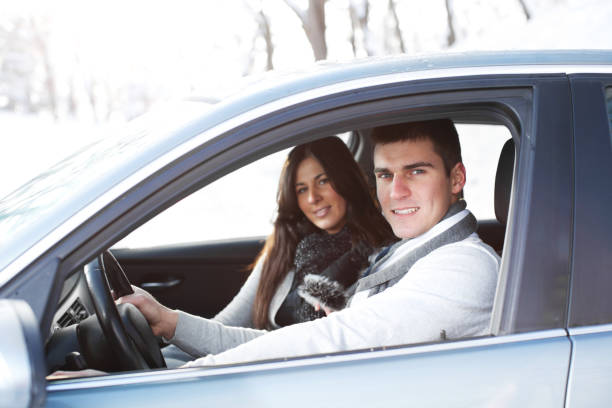 istock Beautiful couple in a car. 184655100