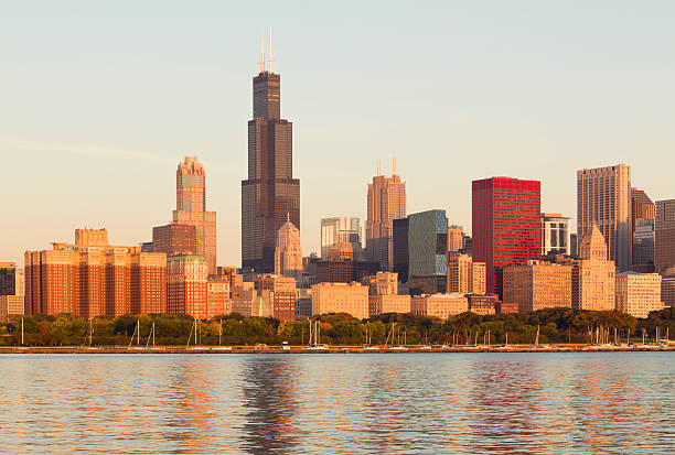 Chicago Skyline at Sunrise "Close-up view of the Chicago skyline shortly after sunrise from across Lake Michigan.For more Chicago images, see:" grant park stock pictures, royalty-free photos & images