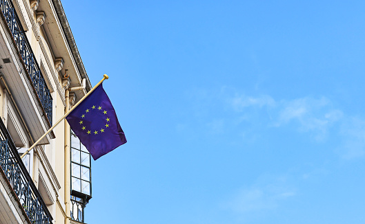The flag of the European Union on a balcony