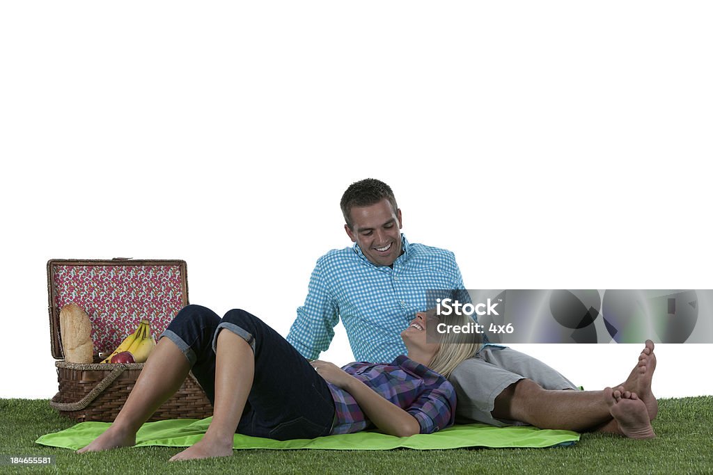 Couple enjoying at picnic Couple enjoying at picnichttp://www.twodozendesign.info/i/1.png 20-29 Years Stock Photo