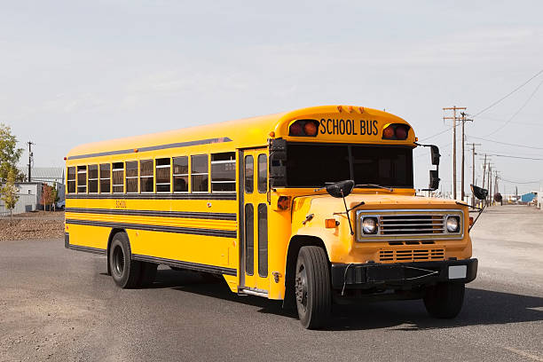 istock Yellow American Schoolbus on the Road 184655634