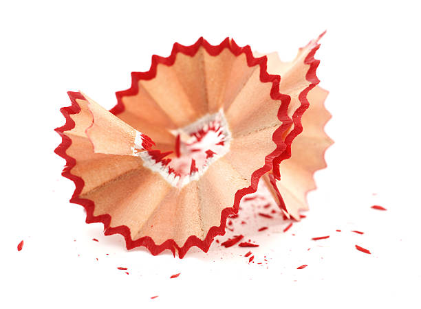 istock Red pencil crayon shavings on white background 184655654
