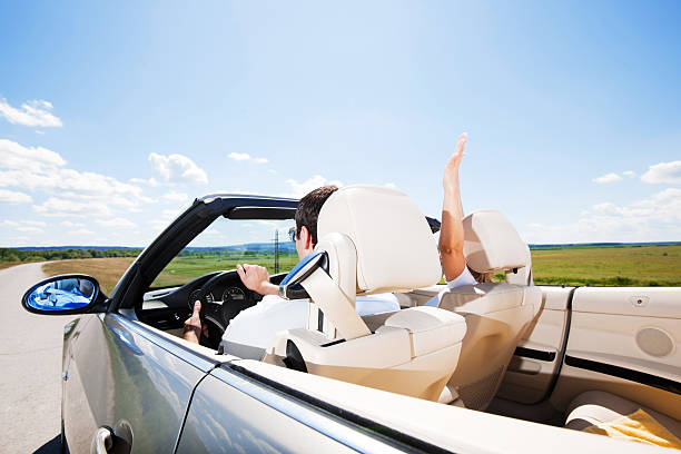 istock Couple travelling in a Convertible car 184655773