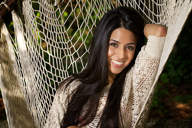 istock Atractive Young Woman posing in a Hammock 184655916
