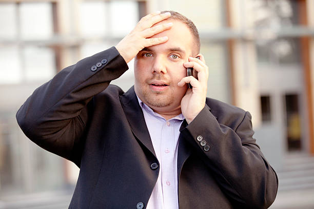 istock Businessman on the phone, worried 184656236