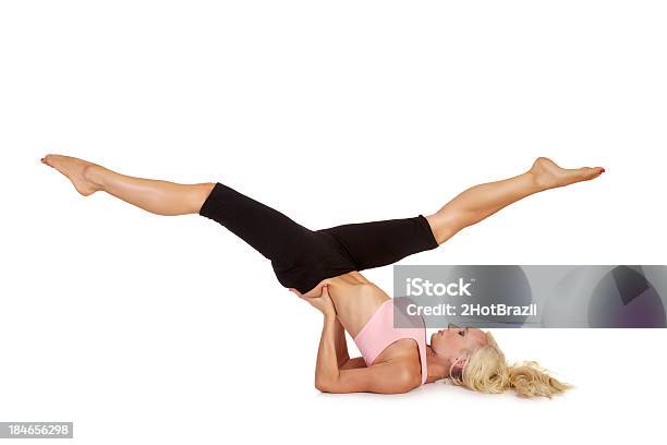 Young Woman Practicing Pilates Isolated Stock Photo - Download Image Now - Activity, Adult, Adults Only
