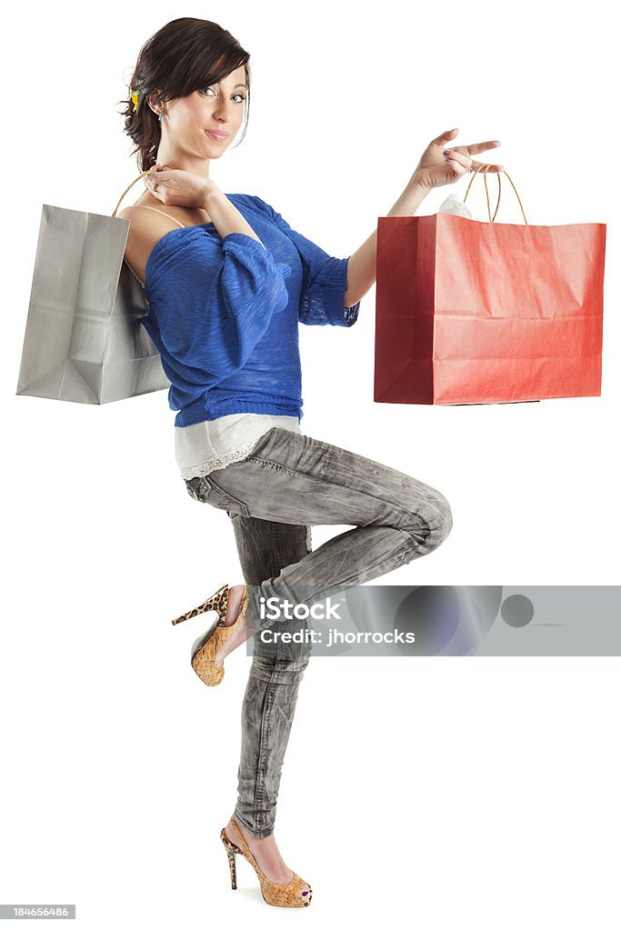 Attraktive junge Frau mit Einkaufstüten - Lizenzfrei Attraktive Frau Stock-Foto