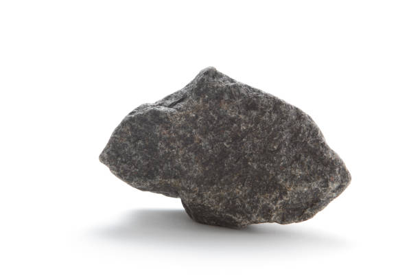 Isolated basalt rock on white stock photo