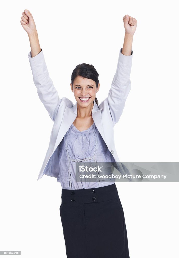 Business achievement Portrait of happy young female executive celebrating victory - white background One Woman Only Stock Photo