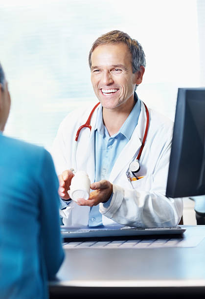 istock Doctor giving drug to patient 184657914