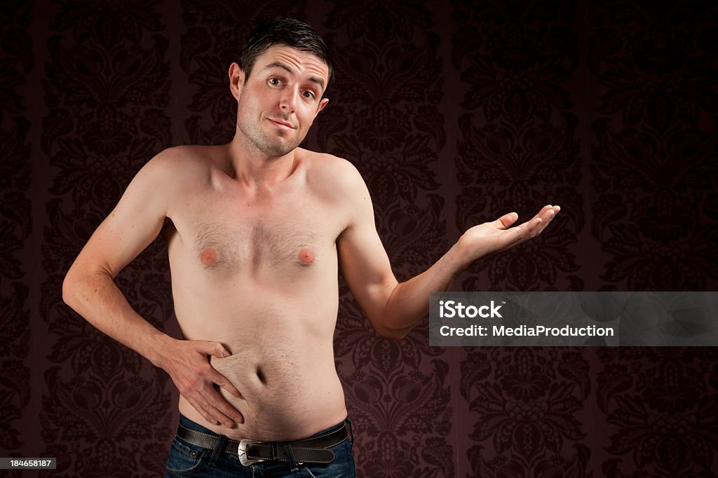 Schmale Mann mit einer Fett Bauch - Lizenzfrei Nackt Stock-Foto