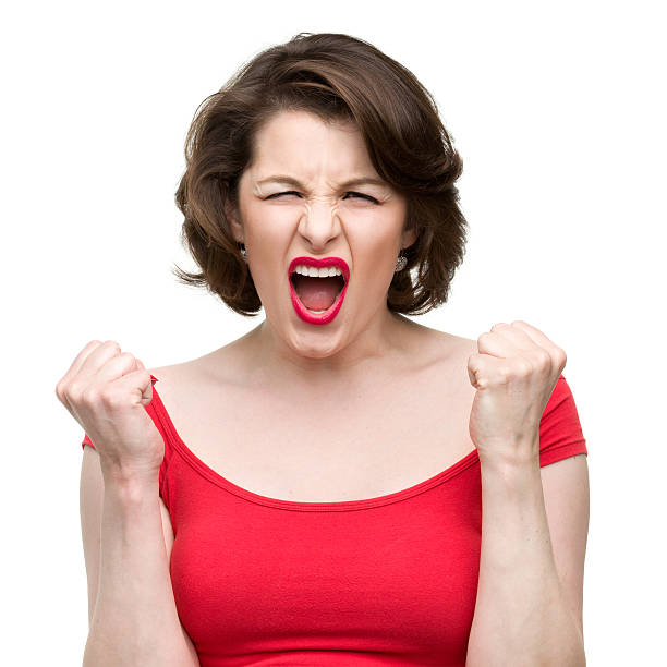 istock Screaming Woman Shakes Fists 184658742