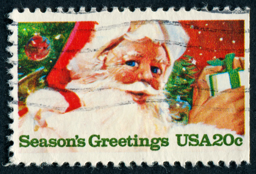 Cancelled United States of America 20 cent stamp featuring Santa Claus