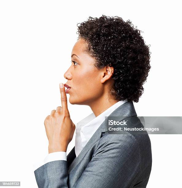 Atractiva Mujer De Negocios Gesticular Ser Tranquilo Aislado Foto de stock y más banco de imágenes de Dedo sobre labios