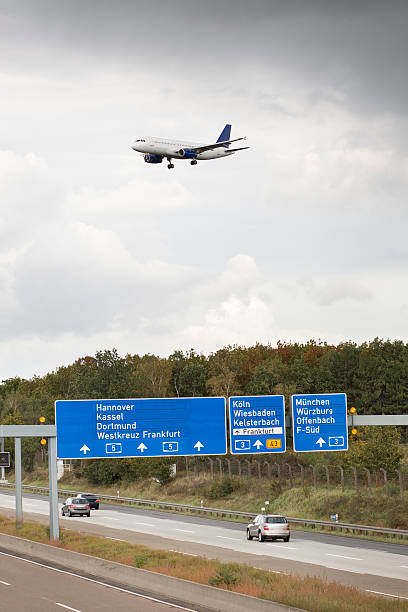 istock Landing approach, airplane crosses motorway A5, Germany 184660102