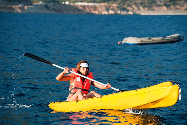 Woman Kyaking on the sea