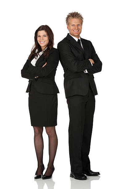 istock Business executives standing with arms crossed 184660324