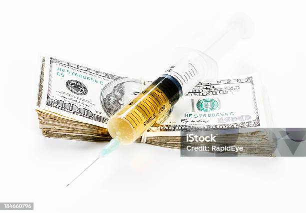 Injection Of Cash Expensive Medication Or Profitable Drug Dealing Stock Photo - Download Image Now