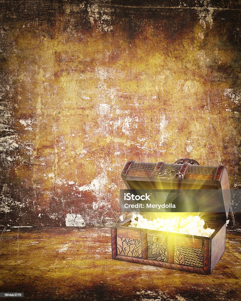 treasure chest with jewelry inside treasure chest with jewelry inside against grunge background Archaeology Stock Photo