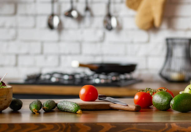 istock Kitchen table with various food vegetables for healthy and diet eating 1846674522