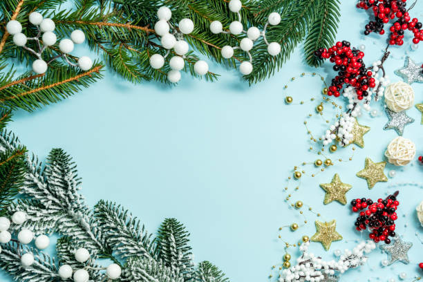istock Christmas pattern on light blue background with colorful decoration ornaments things. Concept of winter, christmas or new year. Flat lay 1846678913