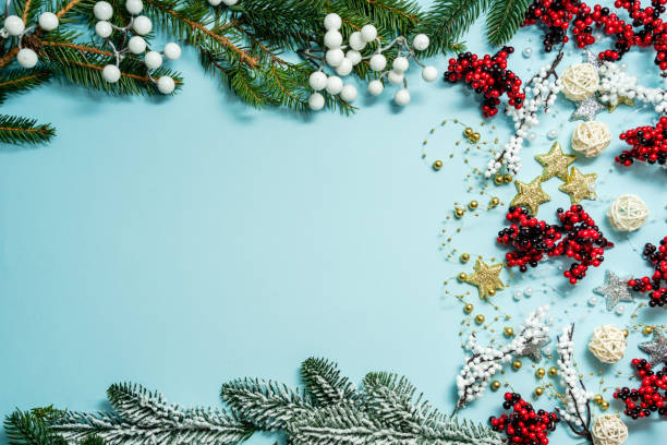 istock Top view on new year composition on light blue background with colorful decoration ornaments things. Concept of winter, christmas or new year. Flat lay, space for text 1846678923