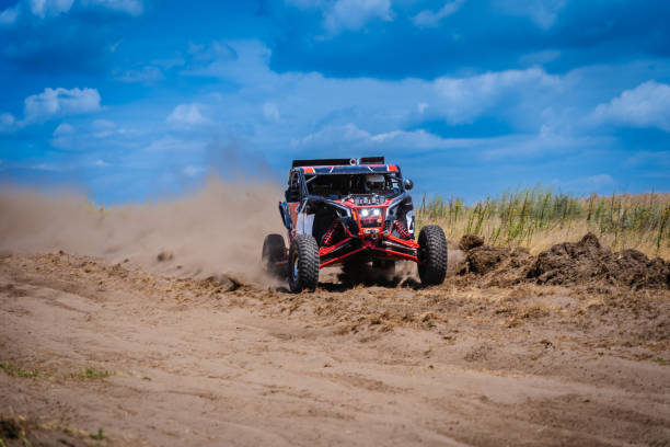 istock UTV buggy and 4x4 offroad in sandy track. Rally extreme riding 1846685743