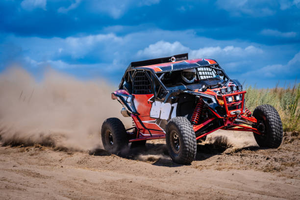 istock UTV buggy and 4x4 offroad in sandy track. Rally extreme riding 1846685748