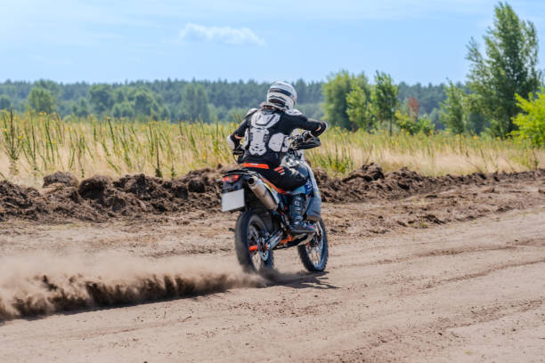 istock Motocross rider riding on extreme dust track 1846685865