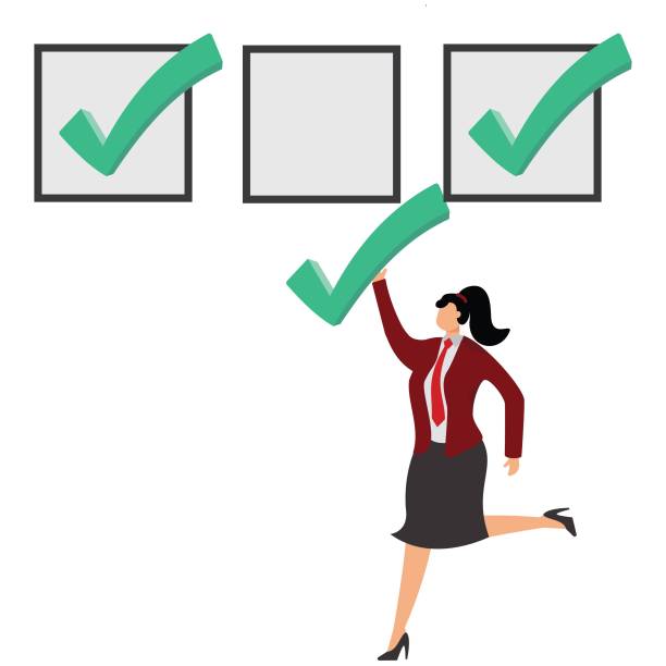 istock Checking the list Businesswoman, chooses check mark and puts it in the check box 1846701573