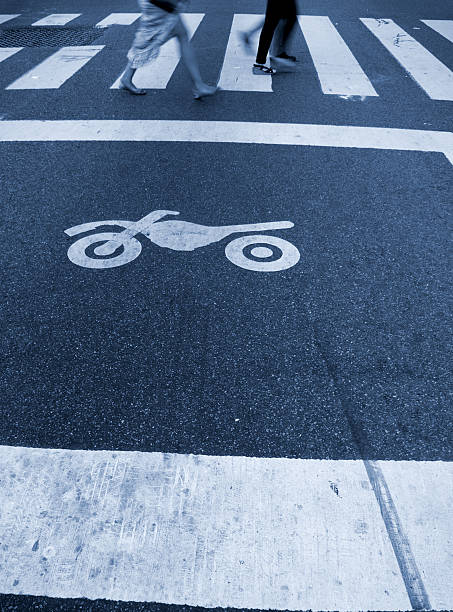 istock Crosswalk and motorcycle symbol 184671451