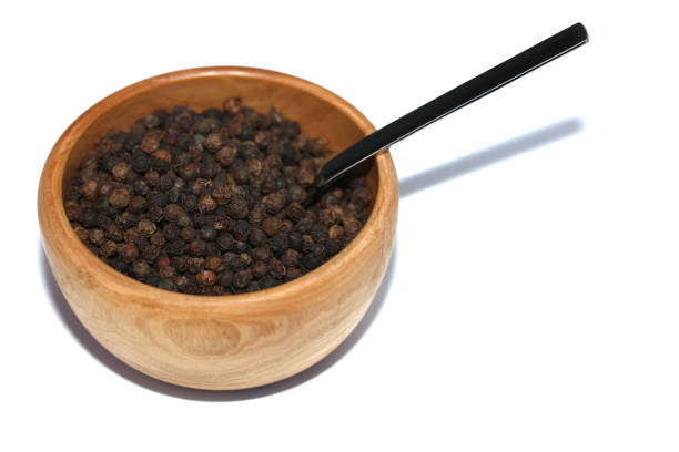 Black pepper on white isolated backgound