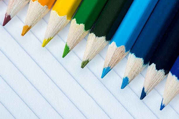 Line of coloured pencils stock photo