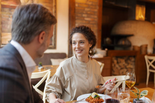 istock Loving Couple Enjoying Lunch in Restaurant 1846752376