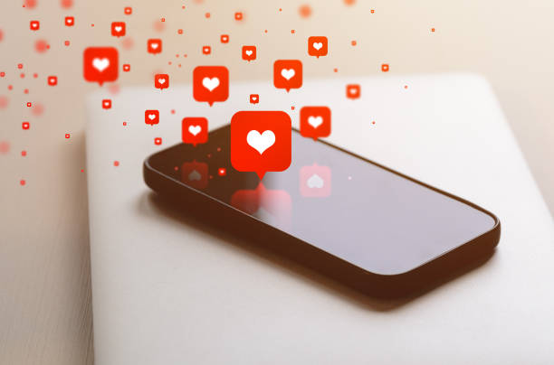 istock Smartphone with many heart-shaped Like notification buttons for social media 1846759065
