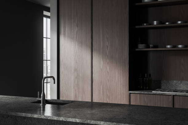 istock Dark home kitchen interior with bar counter and cabinet with stove, window 1846781459