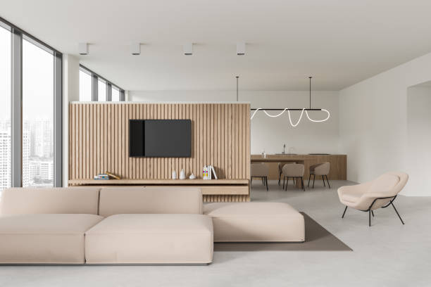 istock White flat interior with couch and window, kitchen with dining and cooking space 1846781481