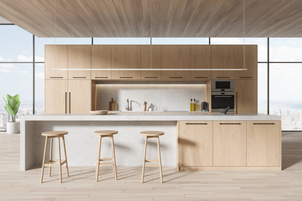 istock Panoramic wooden kitchen interior with cabinets and island 1846789375